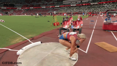 Female Athlete Throwing Discus At Tokyo 2020 Stadium GIF