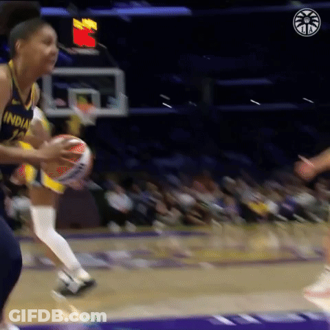 Female Basketball Player Dribbling In Indiana Jersey GIF
