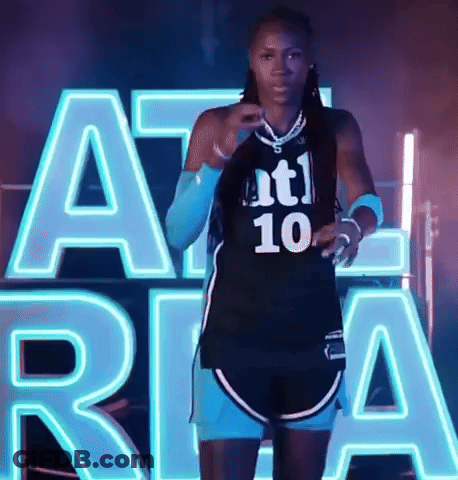 Female Basketball Player In Black Jersey Number 10 GIF
