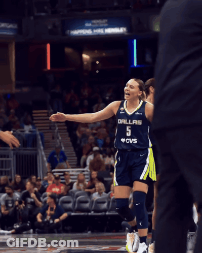 Female Basketball Player In Dallas 5 Jersey Shaking Hands GIF