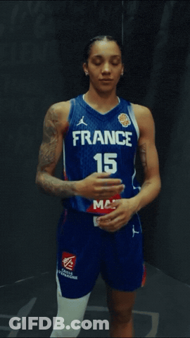 Female Basketball Player In France Jersey With Arms Crossed GIF