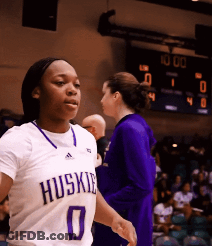 Female Basketball Player In Huskies Jersey Walking GIF