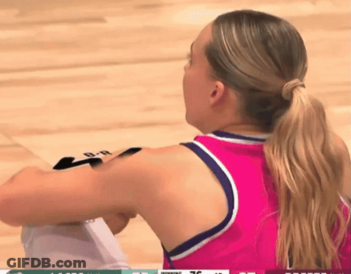 Female Basketball Player In Pink And Purple Jersey With Letter B GIF