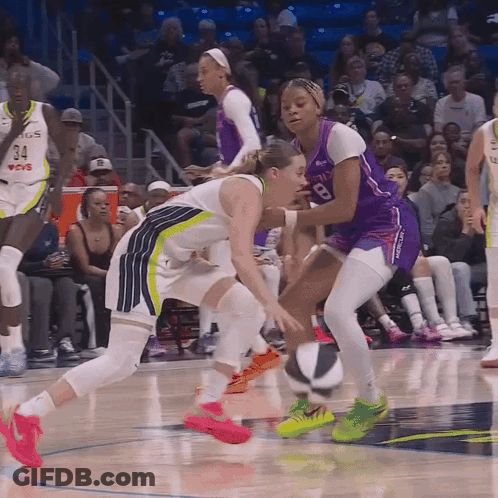 Female Basketball Player In Purple Number 8 Jersey GIF