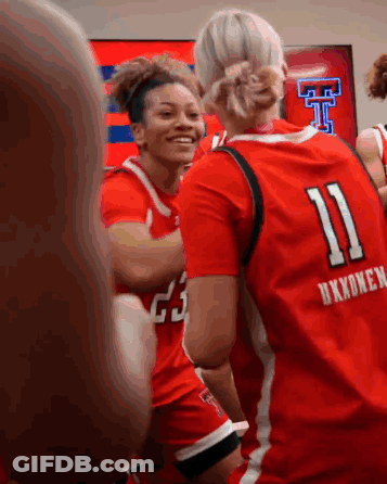 Female Basketball Player In Red Jersey Number 11 GIF