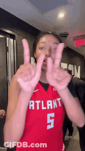 Female Basketball Player In Red Jersey Number 5 GIF