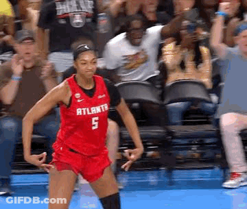 Female Basketball Player In Red Jersey Number 5 Dancing GIF