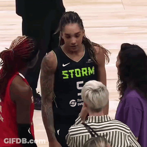 Female Basketball Player In Storm 5 Jersey Talking To Fan GIF