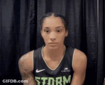 Female Basketball Player In Storm Jersey GIF