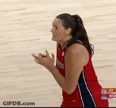 Female Basketball Player In Washington Jersey GIF