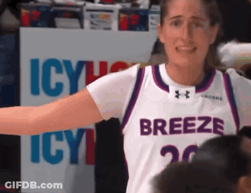 Female Basketball Player In White And Purple Jersey GIF