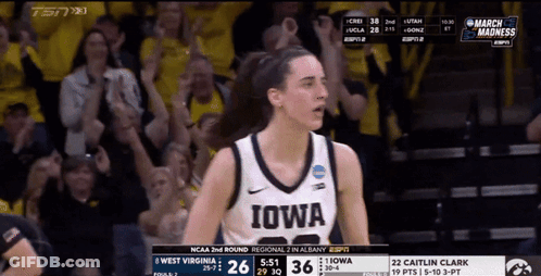 Female Basketball Player In White Iowa Jersey GIF