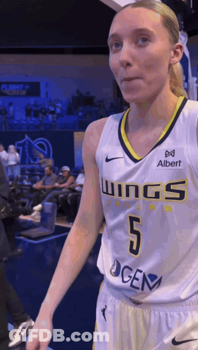 Female Basketball Player In Wings Jersey GIF