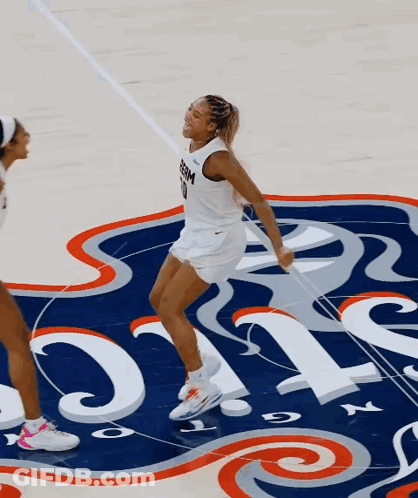 Female Basketball Player Number 10 Jumping GIF