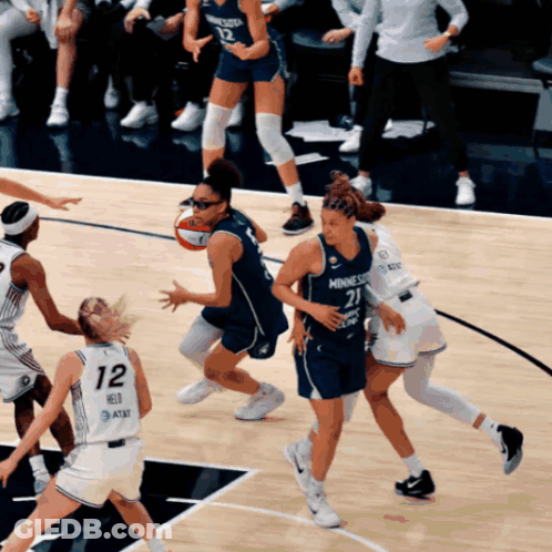 Female Basketball Player Number 12 GIF