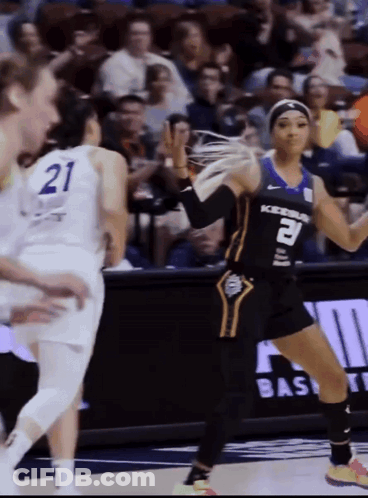 Female Basketball Player Number 21 GIF