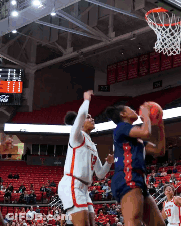 Female Basketball Player Number 23 Going For Layup GIF