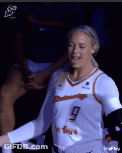 Female Basketball Player Number 9 Sticking Tongue Out GIF