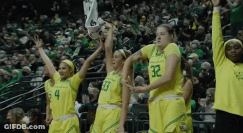 Female Basketball Players In Yellow Jerseys Number 32 GIF