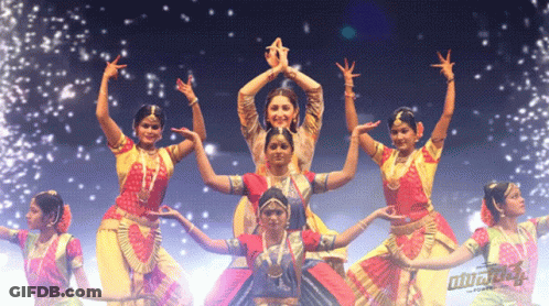 Female Dancers Performing In Front Of Bharatanatyam Sign GIF