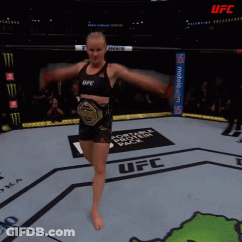 Female Fighter In UFC Ring With Toyo Tires Banner GIF