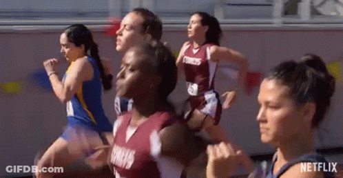 Female Runners Running On Track GIF