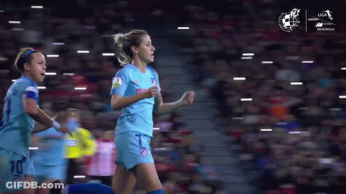 Female Soccer Player In Blue Uniform Number 10 GIF
