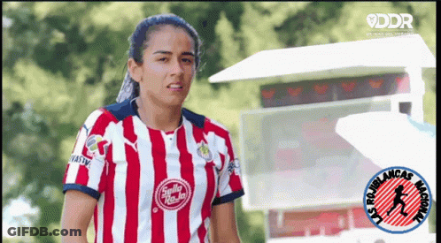 Female Soccer Player In Red And White Stripes GIF