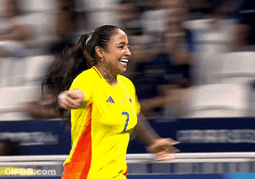 Female Soccer Player In Yellow Jersey Number 2 GIF