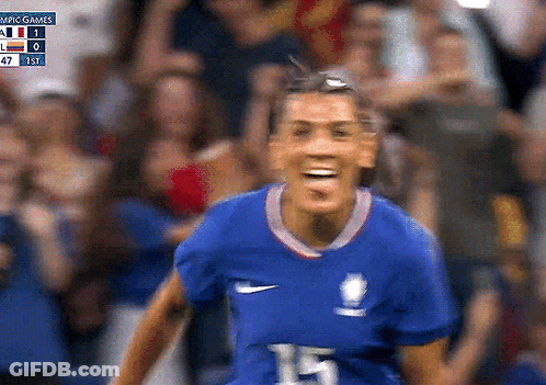 Female Soccer Player Number 15 Smiling At Crowd GIF