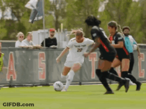 Female Soccer Player Number 29 Kicking Ball GIF
