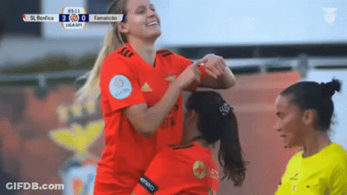 Female Soccer Players Celebrate Goal GIF