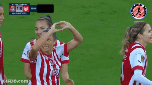 Female Soccer Players Celebrating Goal GIF