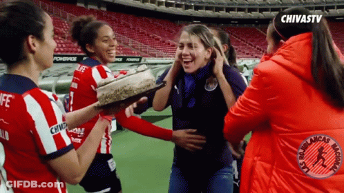 Female Soccer Players Celebrating Win GIF