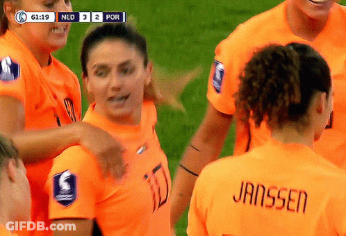 Female Soccer Players Huddled, Janssen On Jersey GIF