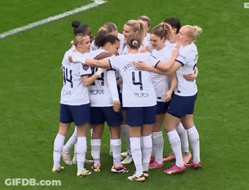 Female Soccer Players Huddled Number 4 Jersey GIF