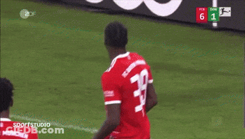 Female Soccer Players Huddled Number 4 Jersey GIF