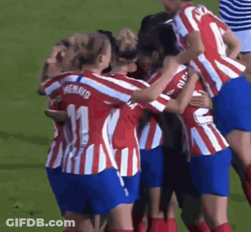 Female Soccer Players Hugging Number 11 GIF
