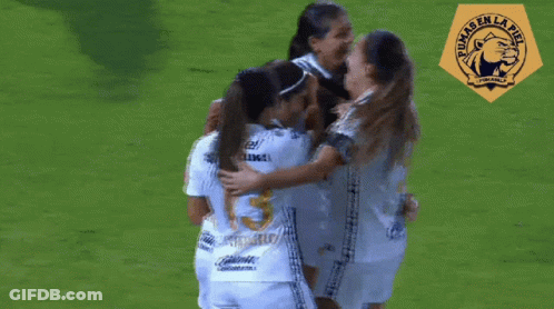 Female Soccer Players Hugging Number 15 GIF