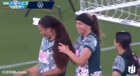 Female Soccer Players Hugging On Field GIF