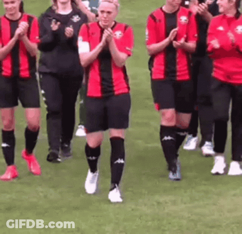 Female Soccer Players Walking On Field GIF