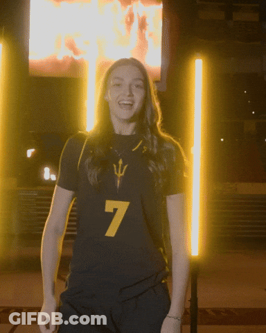 Female Softball Player In Maroon And Gold Duke Uniform GIF