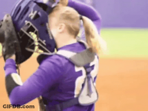 Female Softball Player In Purple Jersey Number 23 GIF