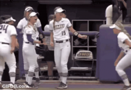 Female Softball Players In White Uniforms Number 15 GIF