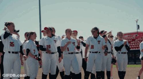 Female Softball Players With T On Uniforms GIF