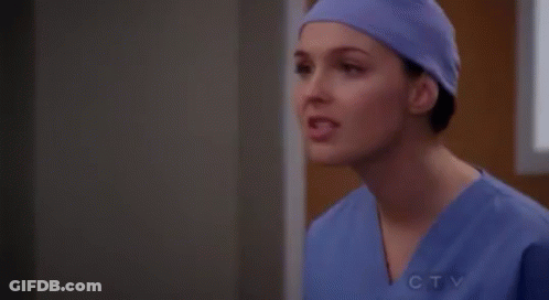 Female Surgeon In Purple Hat And Scrubs GIF
