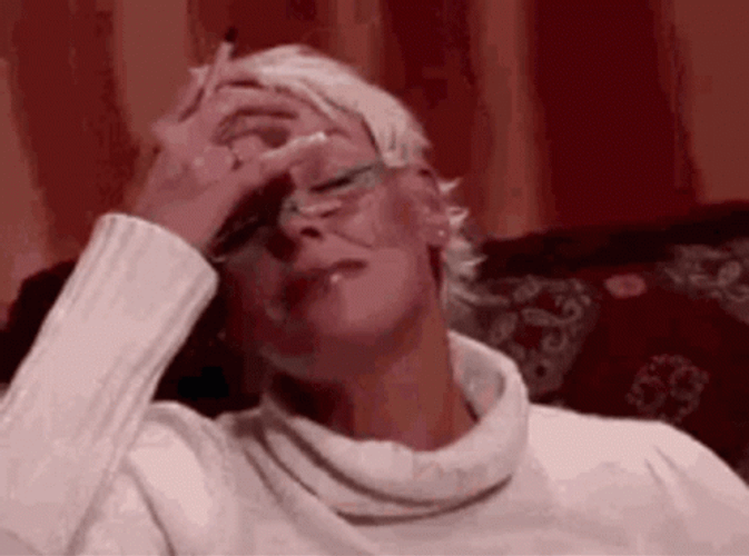 Female Therapist Slightly Laughing GIF