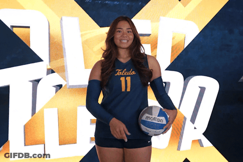Female Volleyball Player From Toledo Holds Molten Volleyball GIF