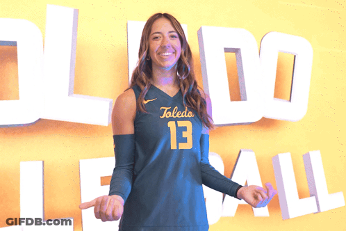 Female Volleyball Player In Front Of Toledo Sign GIF