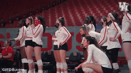 Female Volleyball Players In Face Masks With Letter H GIF